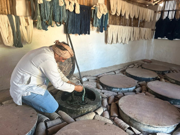 artisan using indigo dye