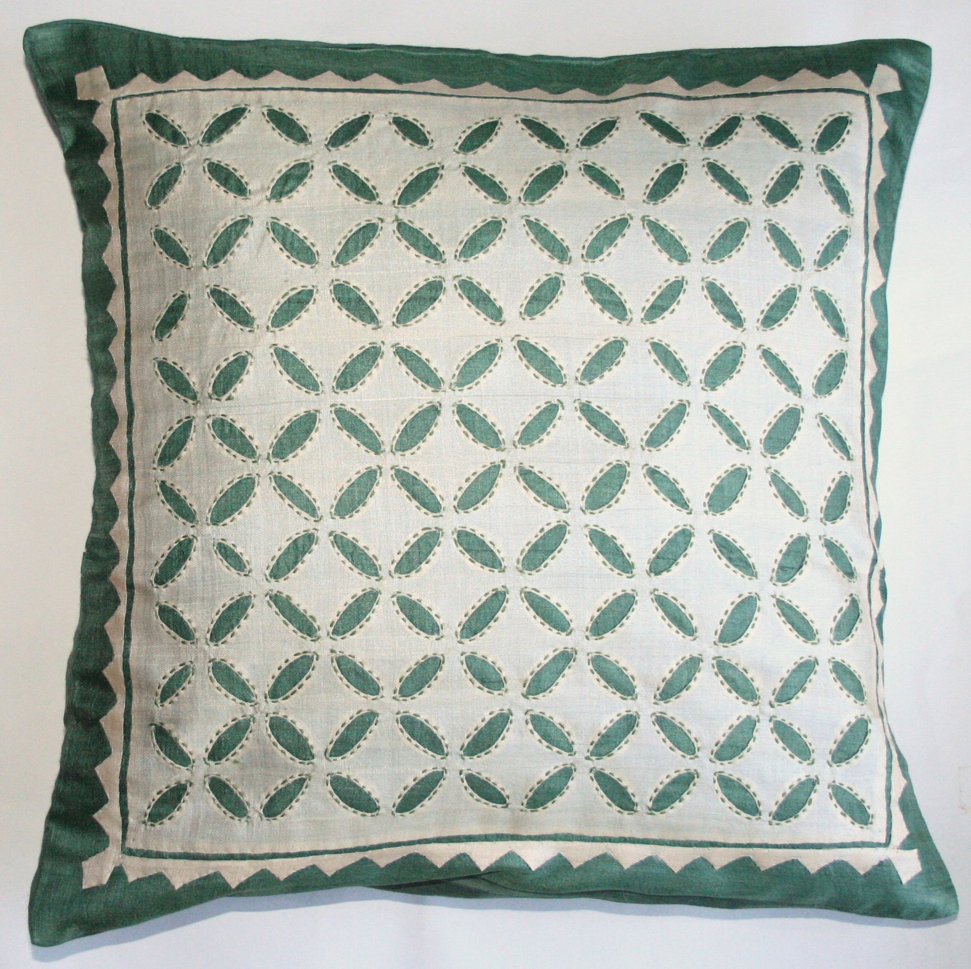 PETALS. Ivory on Green Pillow